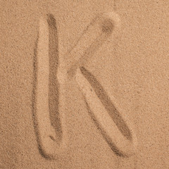 Starfish and shells with sand as background. Sand texture