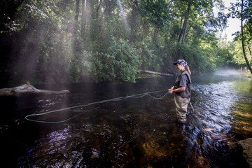 Teenage Girl Fly Fishing