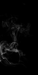 Abstract smoke moves on a black background