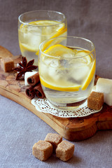 Glasses with cold lemonade and ice cubes..