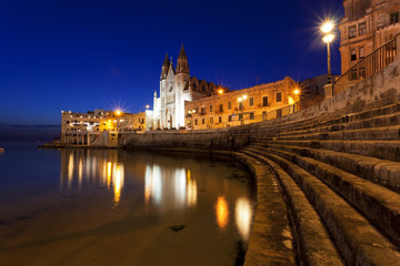 Fototapeta na wymiar Church of Our Lady of Mount Carmel in Sliema, Malta at dawn 
