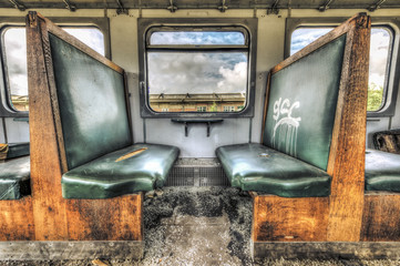 Old vandalized railcar compartment - 115950841