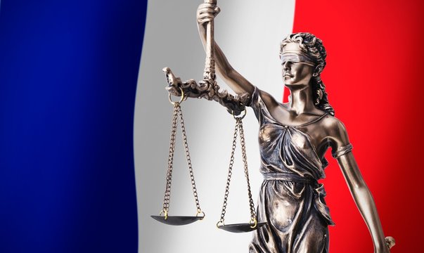 Themis with scale, symbol of justice on French flag background