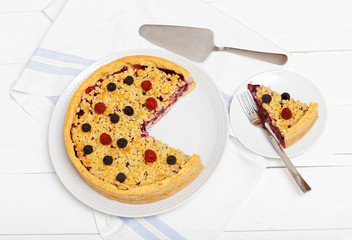 Homemade raspberry tart with curd cream and shtreyzel