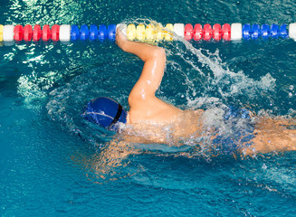 boy swimming in the pool