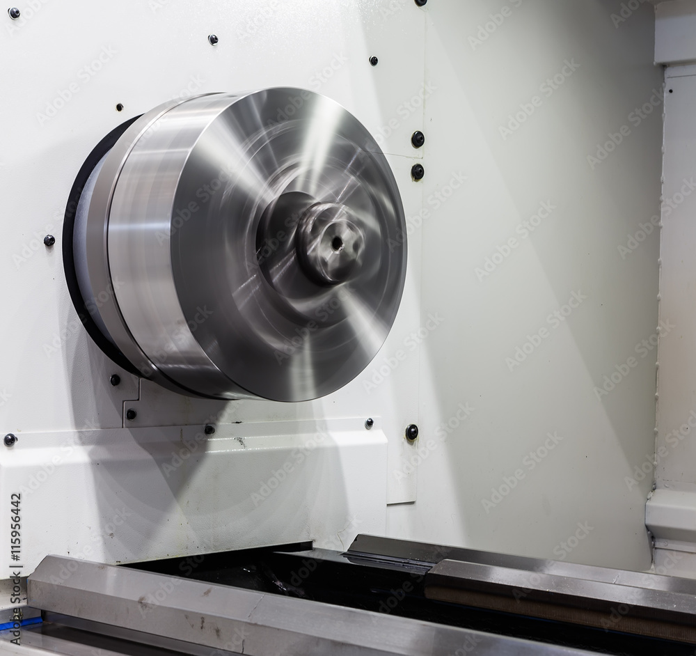 Poster rotating shiny metal part of the cnc lathe