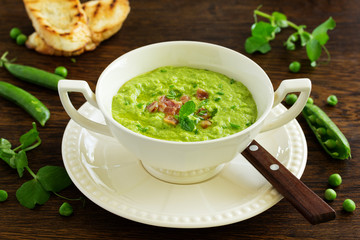 Soup of green peas with bacon and mint.