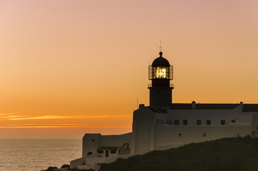 Fototapeta na wymiar view of the lighthouse during sunset, symbol of guard