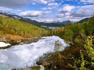 Fototapeta na wymiar Waterfall / Strong River in Norway