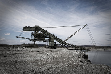 Excavator at a lake