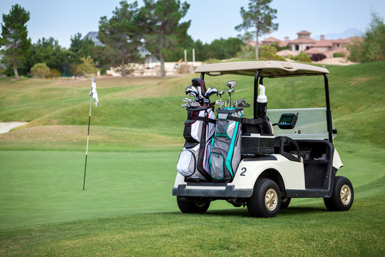 Golf cart on golf course.
