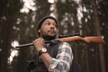 Interracial hunter in the forest