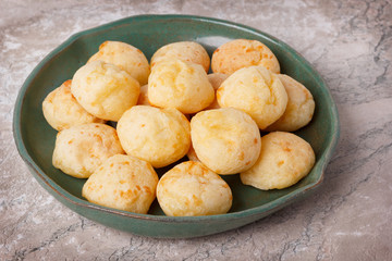 Brazilian snack cheese bread (pao de queijo) on plate