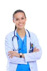 Fototapeta premium Woman doctor with stethoscope standing with arms crossed isolated on a white background