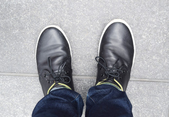 Black shoes on the ground