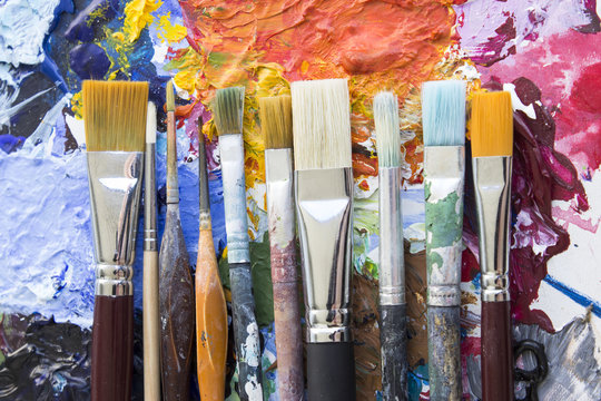 Various Paintbrushes on a Palette.