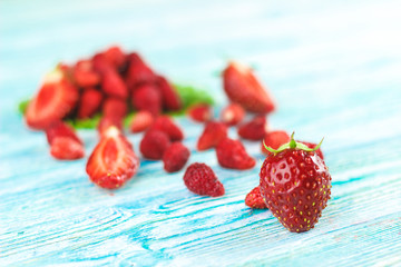 ripe strawberries on wooden background