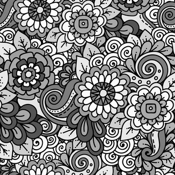 Doodle background with doodles, flowers and paisley. Seamless pattern