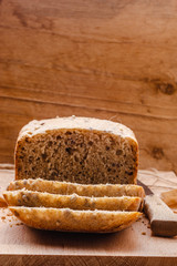 Sliced whole wheat bread on cutting board
