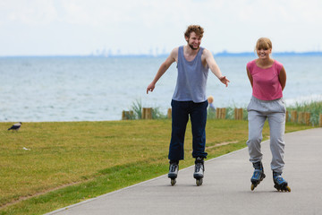 Fototapeta premium Teens together on skating date.