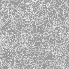 Black and white seamless hand drawn pattern with abstract flowers.