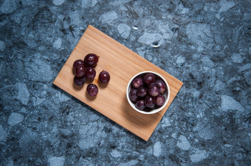 Fresh grape fruits on marble table. Flat lay.