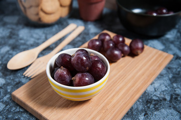 Fresh grape fruits on marble table. Flat lay.