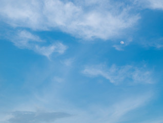 blue sky with cloud and moon .