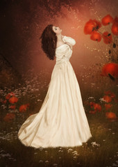 Young girl with long curly hair with dreamy eyes  surrounded by a magical of poppies 