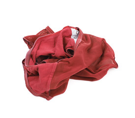 Crumpled red female panties isolated
