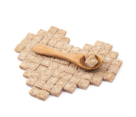 Heart shape made of sugar cubes isolated