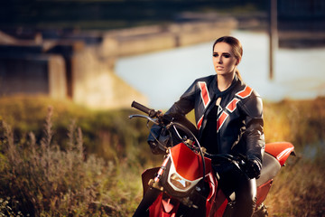 Female Motocross Racer Next to Her Motorcycle 