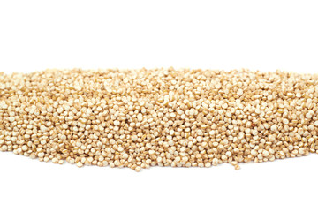 Pile of grain quinoa seeds isolated