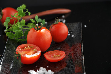 Fresh Tomato on Plate with Sea Salt