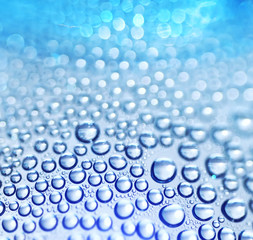 Water drops.  Blue background