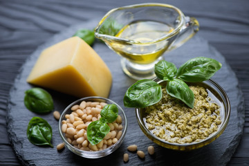 Close-up of ingredients for preparing basil pesto sauce