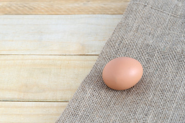 Eggs on wooden table background