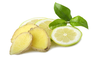 Fresh sliced ginger root lemon and leaves on the white