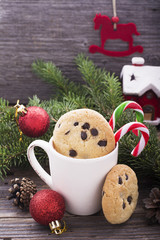 Cookies and milk for Santa Clause on wooden background