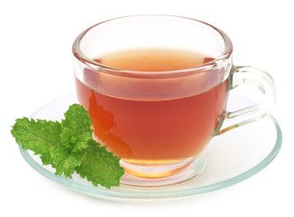 Herbal tea in a cup with mint leaves