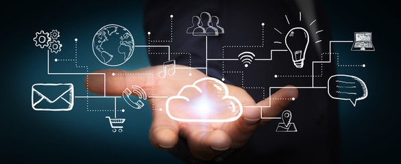 Businessman holding hand drawn multimedia icons