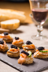 Smoked Salmon Canapes with Sour Cream and Caviar