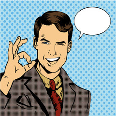 Man smile and shows OK hand sign with speech bubble. Vector illustration in retro comic pop art style - obrazy, fototapety, plakaty