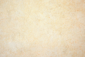 Abstract beige wrinkled paper background