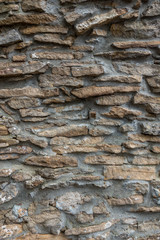The gray und old stone wall