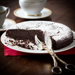 A chocolate cake and coffee