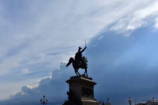 King and clouds. Vittorio Emanuele king of Italy monument in Venice, made by sculptur Ferrari in 1887