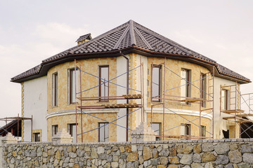House facade tiled by stone