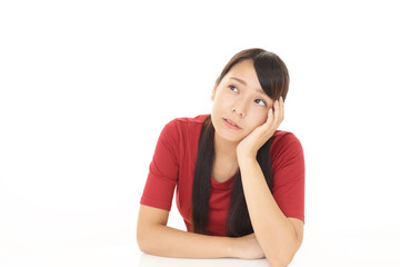 Fototapeta premium 悩む女性