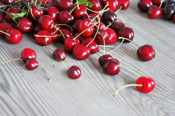 Obraz na płótnie Canvas Cherry on wooden table. Harvest Concept. Close up, high resolution product.